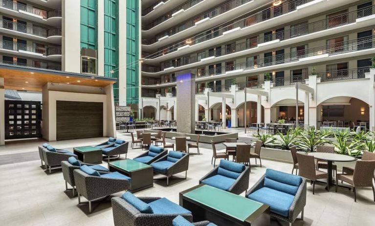 Lobby workspace with comfortable seating at Embassy Suites By Hilton Miami - International Airport.