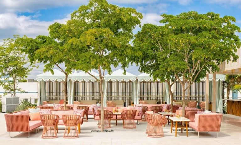 Terrace bar with lounge area at The Goodtime Hotel.