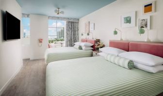 Day use twin room with lounge chairs and private bathroom at The Goodtime Hotel.