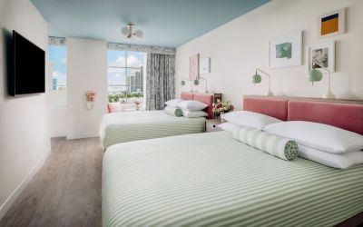Day use twin room with lounge chairs and private bathroom at The Goodtime Hotel.