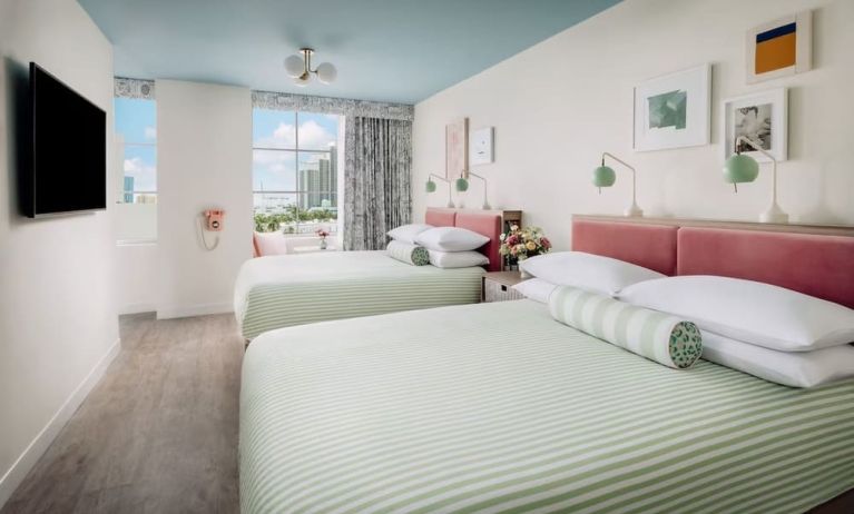 Day use twin room with lounge chairs and private bathroom at The Goodtime Hotel.