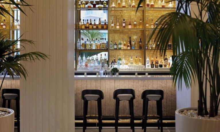 On-site bar at Cadillac Hotel & Beach Club, Autograph Collection' lobby. 