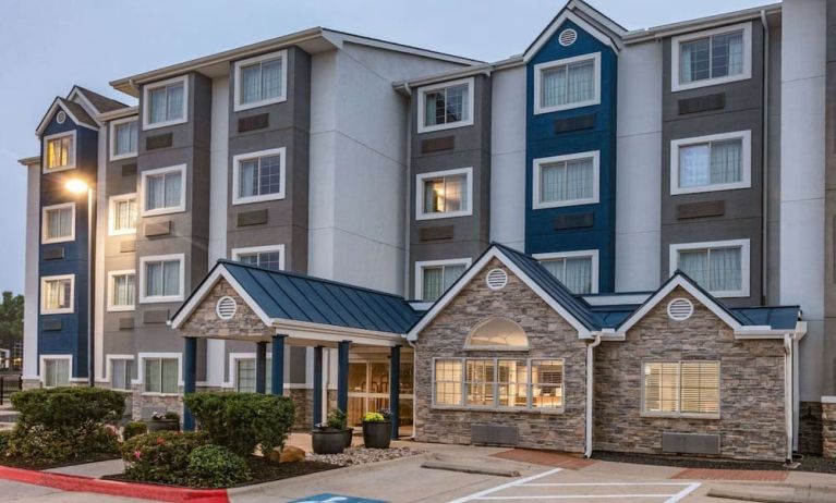 Parking at Microtel Inn And Suites By Wyndham Austin Airport.