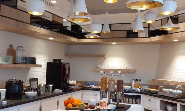 Kitchen available at Hilton Garden Inn Massy.
