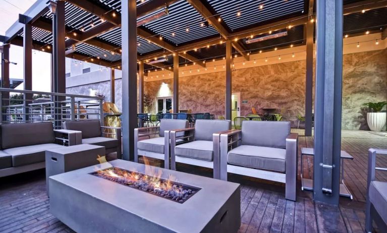 Outdoor seating at Home2 Suites By Hilton San Francisco Airport North.