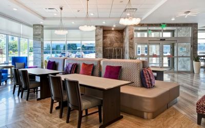 Coworking space and lounge at Home2 Suites By Hilton San Francisco Airport North.