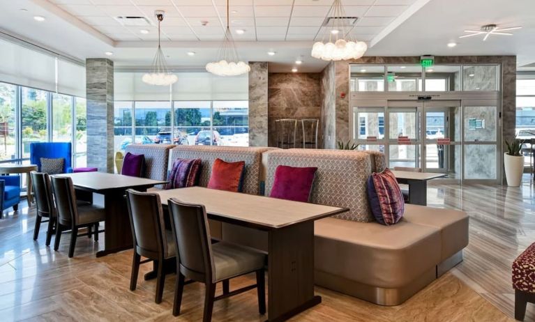Coworking space and lounge at Home2 Suites By Hilton San Francisco Airport North.
