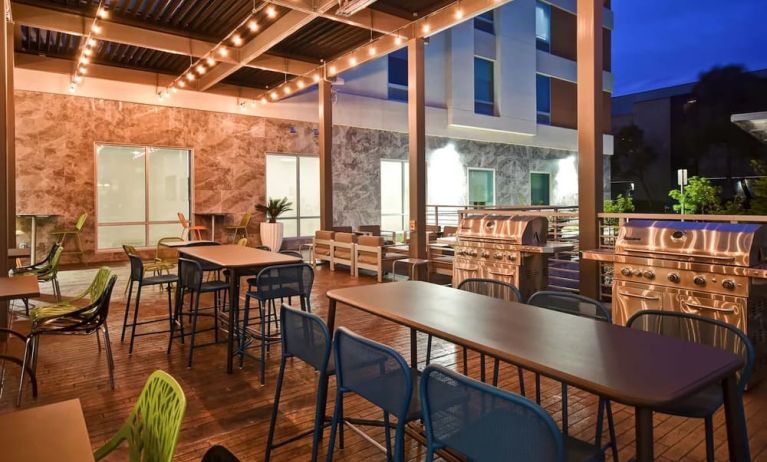 Outdoor seating at Home2 Suites By Hilton San Francisco Airport North.