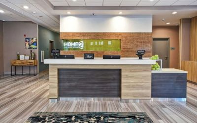 Reception desk at Home2 Suites By Hilton San Francisco Airport North.