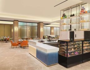Restaurant at Hilton Garden Inn Surat City Centre.