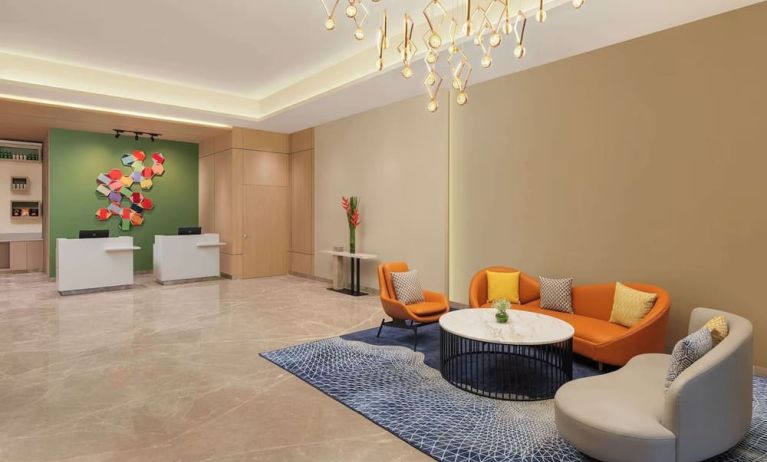 Lobby seating at Hilton Garden Inn Surat City Centre.