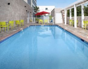 Outdoor pool at Home2 Suites By Hilton Miami Doral West Airport.