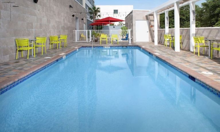 Outdoor pool at Home2 Suites By Hilton Miami Doral West Airport.