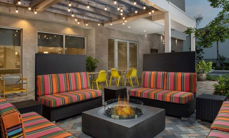 Outdoor seating at Home2 Suites By Hilton Miami Doral West Airport.