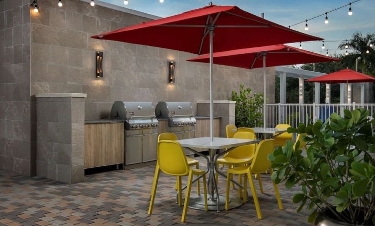 Outdoor seating at Home2 Suites By Hilton Miami Doral West Airport.