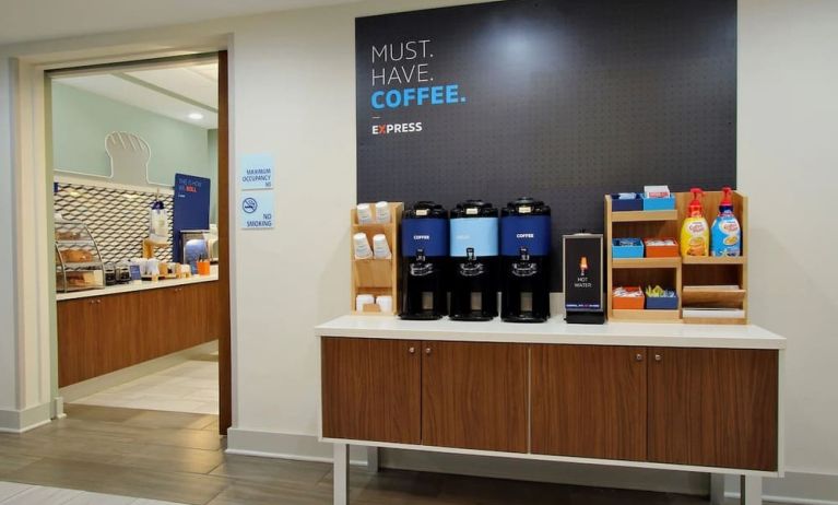 Coffee station at Holiday Inn Express Hotel & Suites Carlsbad Beach.