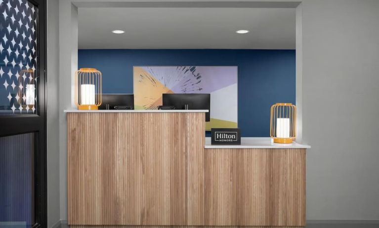 Reception desk at Spark By Hilton Tucson Airport.