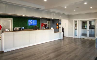 Reception desk at Capri Suites Anaheim.