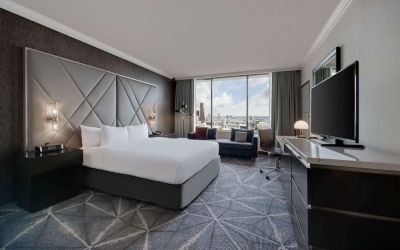 Day use room with work desk and sofa at Hilton Atlanta.