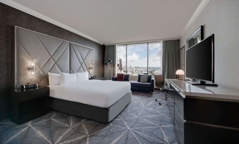 Day use room with work desk and sofa at Hilton Atlanta.