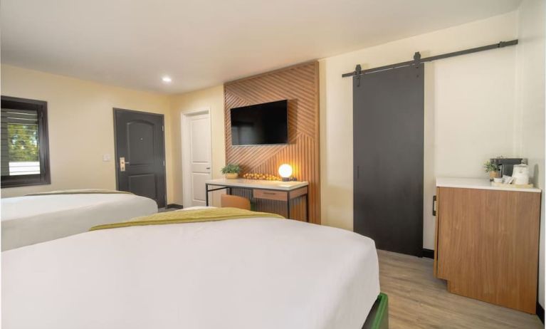 Day use room with TV and natural light at LYFE INN & SUITES By AGA.