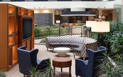 Elegant coworking area in the hotel lobby of the Embassy Suites by Hilton San Francisco Airport.