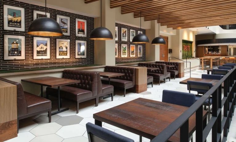 Dining area perfect for coworking at Embassy Suites by Hilton San Francisco Airport.
