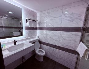 Private bathroom at THE VINE HOTEL BRONX.