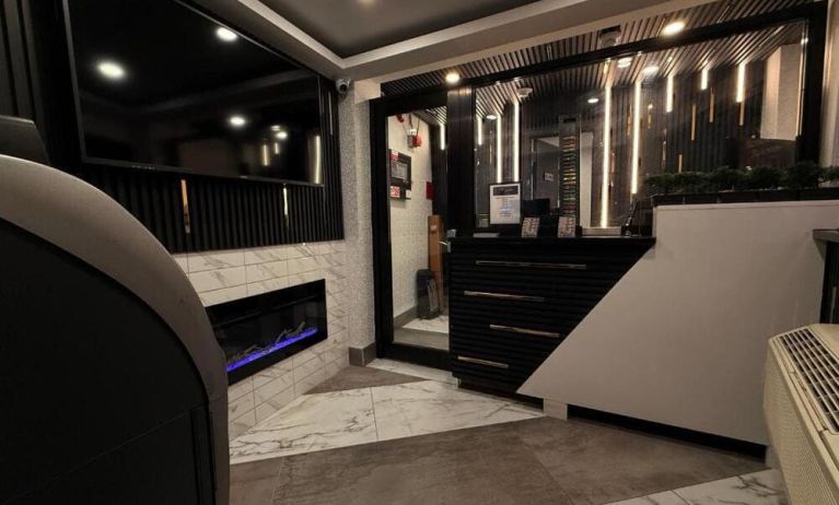Reception desk at THE VINE HOTEL BRONX.