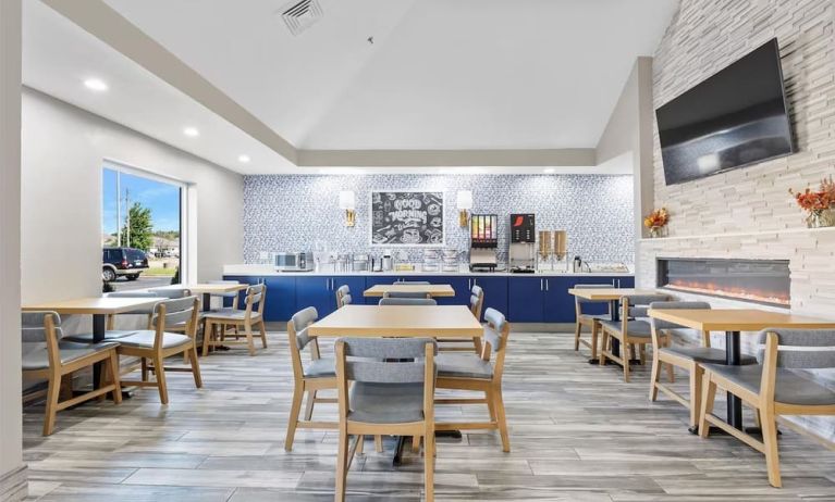 Dining room at AmericInn By Wyndham Urbana.