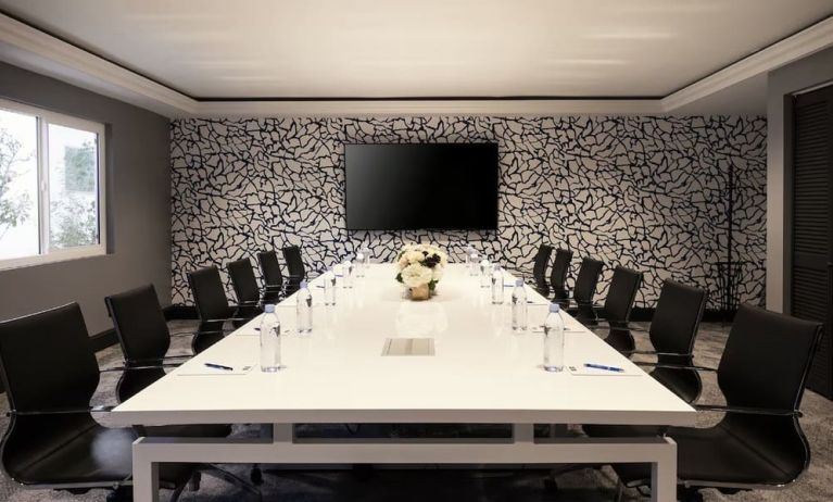 Professional meeting room with ergonomic chairs at Montrose At Beverly Hills.