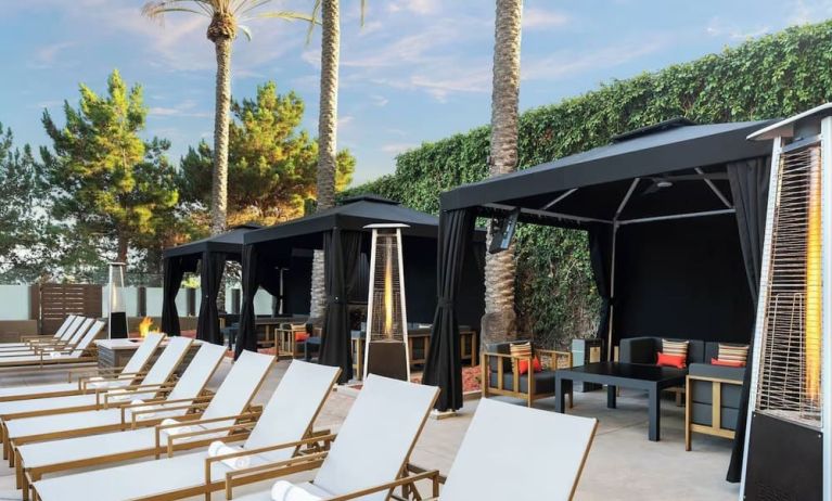 Plenty of sun loungers and cabanas available beside the pool at Marriott Del Mar.