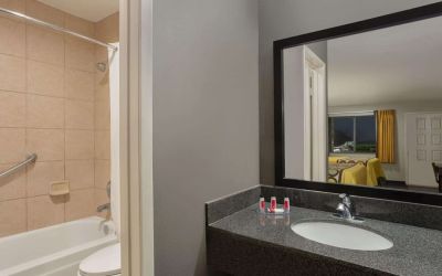 Guest bathroom at Super 8 By Wyndham Universal City.