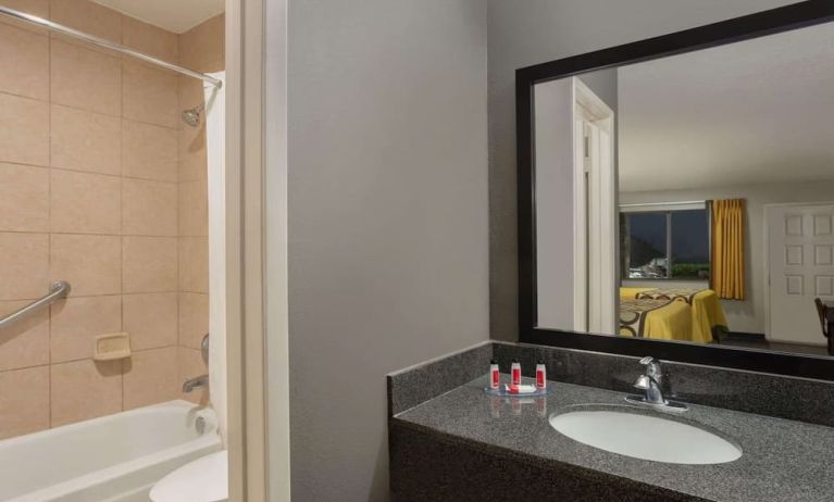 Guest bathroom at Super 8 By Wyndham Universal City.