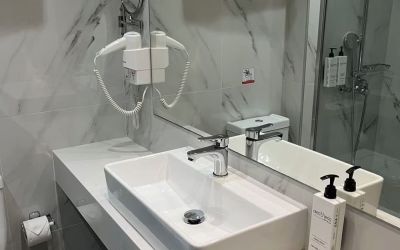 Guest bathroom at Boss Boutique Athens.