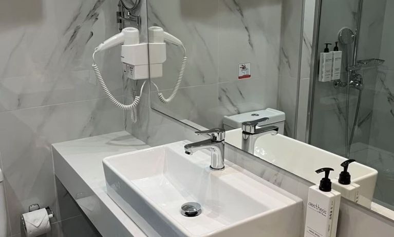 Guest bathroom at Boss Boutique Athens.