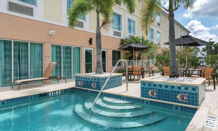 Outdoor pool at Sleep Inn & Suites Port Charlotte - Punta Gorda.