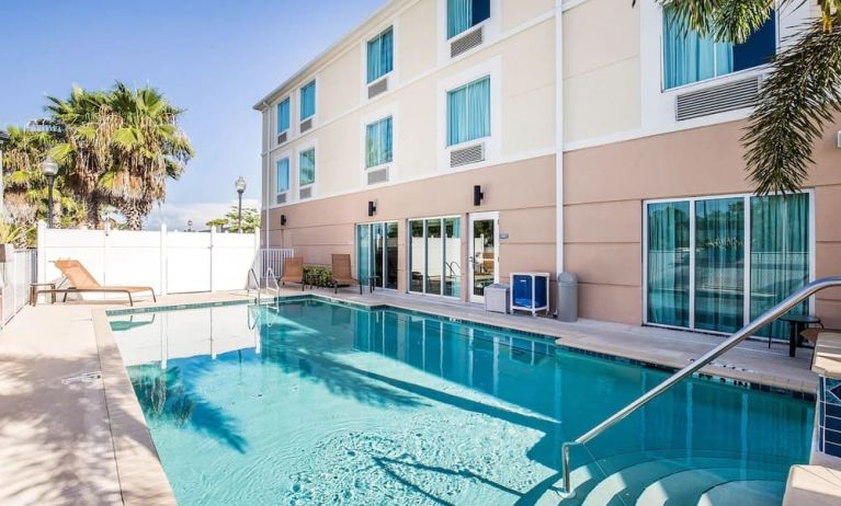 Outdoor pool at Sleep Inn & Suites Port Charlotte - Punta Gorda.