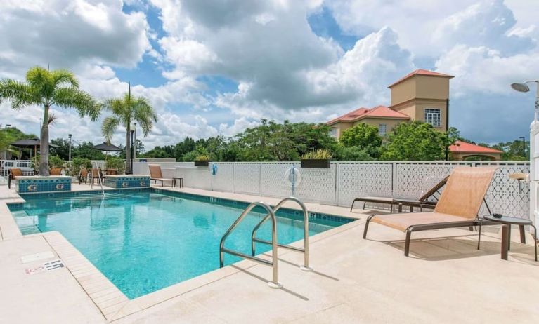 Outdoor pool at Sleep Inn & Suites Port Charlotte - Punta Gorda.
