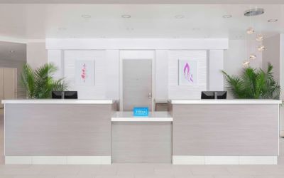 Front desk at Hilton Garden Inn Calgary Airport.