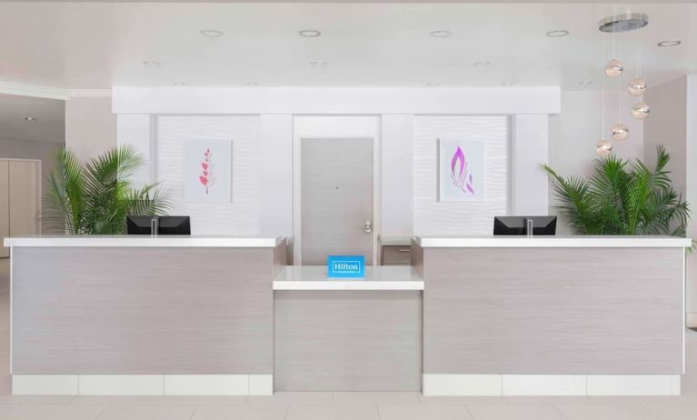 Front desk at Hilton Garden Inn Calgary Airport.