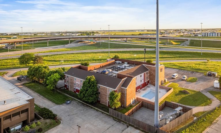 Property exterior at Coratel Plus Suites Wichita West Airport.