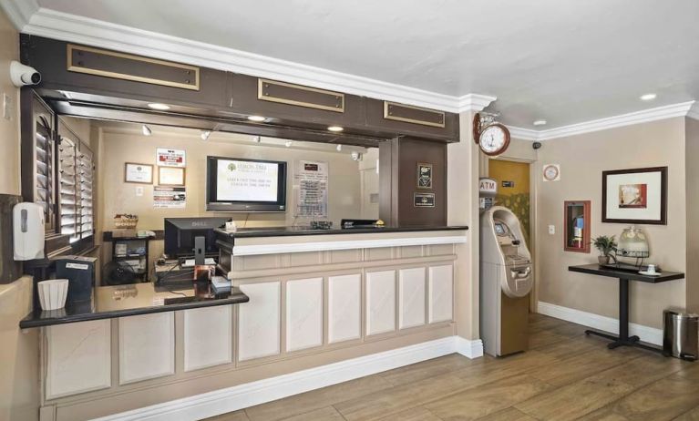Reception desk at Lemon Tree Hotel & Suites Anaheim.