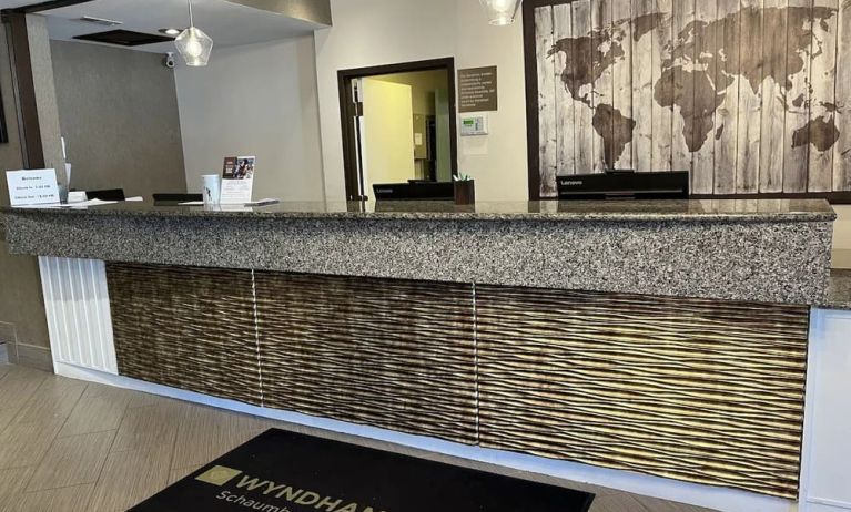 Reception desk at Wyndham Garden Schaumburg Chicago Northwest.