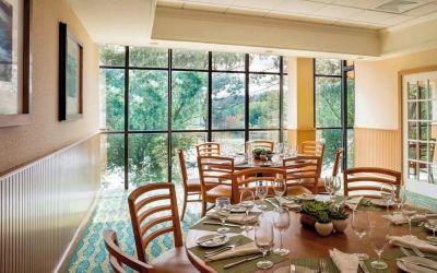 Dining area with natural light perfect for coworking at Boston Marriott Newton.