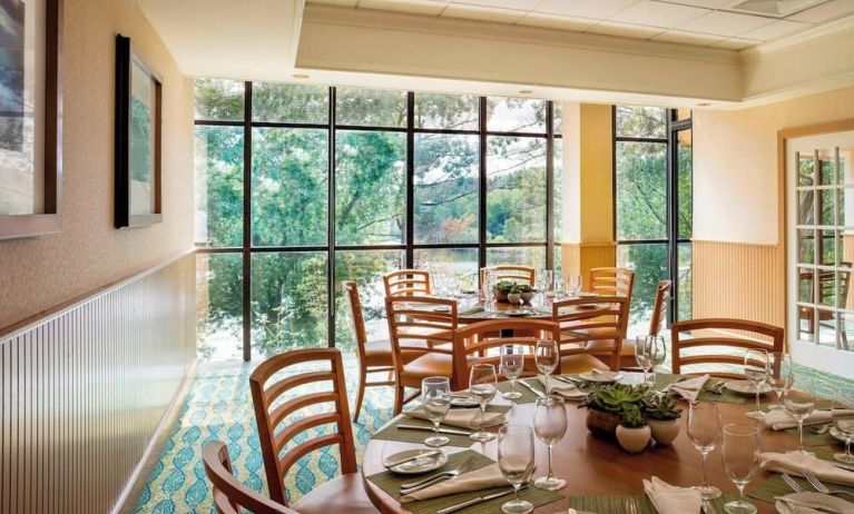 Dining area with natural light perfect for coworking at Boston Marriott Newton.