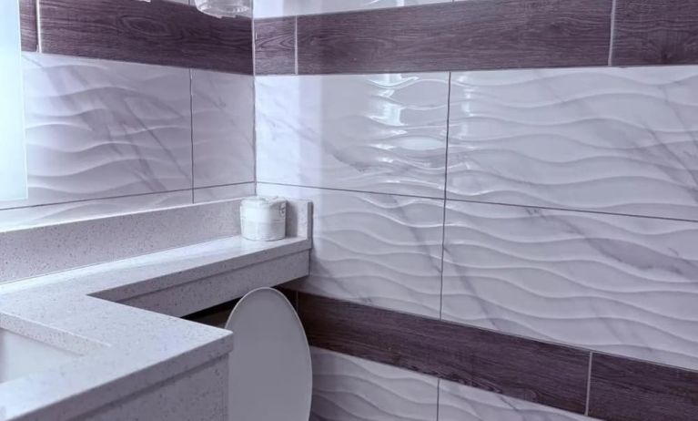 Guest bathroom at THE VINE HOTEL BRONX.