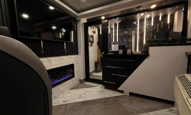 Reception desk at THE VINE HOTEL BRONX.