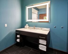 Guest bathroom at Home2 Suites By Hilton El Reno.