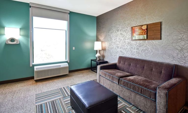 TV lounge area at Home2 Suites By Hilton El Reno.